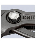 Close-up of the push button on Cobra Water Pump Pliers 10 Inch With Self Locking Grip Quick Touch Button Adjustment