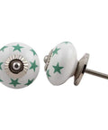 Set Of 100 Ceramic White Star Drawer Knobs For Kitchen Cabinets And Dressers Offering Reliable Rust Proof Coating Straight Up Simple Mount Hella Sturdy Hardware For Your Sweet Kitchen Makeover, showing 1.75 inch white ceramic knobs with green stars.