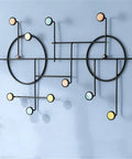Heavy Duty Wall Mount Coat Hooks Iron Door Rack Knockout Nordic Design with colorful round hooks on a blue wall.