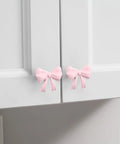 Pink Bow Dresser Knob Set With 30 Knobs And 90 Screws, 1.57 Inch Aluminum Alloy Handles on white cabinet doors