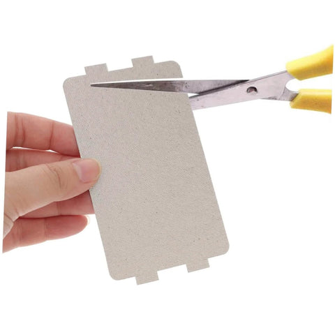 Cutting a sheet from Six Pack Microwave Mica Sheet Heat Insulation Covers For Everyday Use, Waveguide Guard Replacement Kit