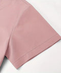 Close-up of the pink sleeve from the V Neck Quick Dry Scrub Set For Beauty Salons And Pet Shops Pink XL 3 Piece Workwear