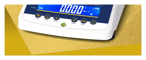 Close-up of Professional Digital Density Meter For Straight Up Gold Purity Testing And Platinum Jewelry Analysis with display and controls.