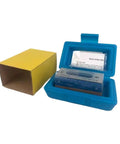 Job Site Ready Bubble Level For Construction And Framing inside blue case next to yellow box for easy transport and storage.