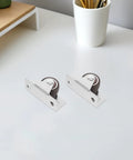 No Sweat Silent TPR Drawer Casters 4 Piece Heavy Duty Fixed Rolling Wheels For Office Cart And Cabinet Smooth Ride Replacement Hardware Flat Plate Mount Brackets displayed on a desk.