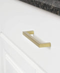 Modern Square Cabinet Pull Handle With Golden Champagne Finish, 5.39-Inch Length, installed on a white cabinet drawer.