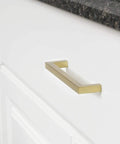 Golden Champagne Modern Square Cabinet Pull Handle 4-1/8 Inch Length With 3-3/4 Inch Center And 1-1/10 Inch Projection on white cabinet