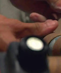 Person wrapping object with XtremeFLEX Mid-Temperature Silicone Heating Tape With Adjustable Thermostat Control, 144W, 120V, 2 Feet.