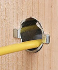 Southwire Smart Shield wire protection guard installed on a wooden stud with a yellow electrical cable.