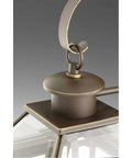Close-up of Burlington Two-Light Hanging Lantern In Oil Rubbed Bronze Finish, featuring metal hook and clear beveled glass.