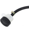Hydraulic disc brake hose end with white plastic adapter and black cap, side view