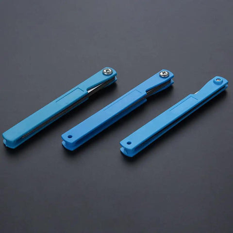 Top Shelf Feeler Gauge Set With Rock Solid Stainless Steel Blades For Nailing Dead Accurate Gap Measurements And Tappet Valve Adjustments On Every Hardcore Hobbyist Or Weekend Mechanic Garage Project in blue. 3 gauge blades displayed.