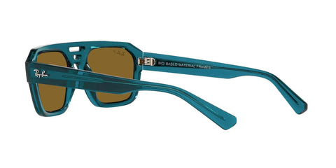 Side view of Corrigan Square Sunglasses with transparent light blue frame and dark brown polarized lenses, eco-friendly acetate.