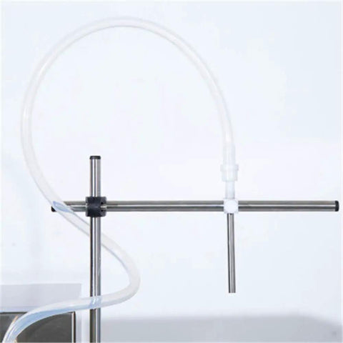 Pro Liquid Filling Machine With Magnetic Pump And Digital Speed Control Smooth Operator for perfumes, thick oils, and detergents tubing detail.