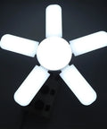 LED Garage Light with Five Adjustable Panels, 100W 8000LM Deformable Ceiling Light, top view illuminated, 6500K Daylight