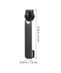 Close-up of Six Piece Black Zipper Repair Kit For Luggage Backpacks Jackets And More Universal Metal Zipper Pull Replacement Slider