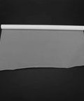 PTFE Film Sheet 11.8 By 39.37 Inches 0.1mm Thick Nonstick Heat Press Shield rolled out on black background