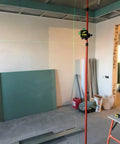 Telescoping Laser Pole With Adjustable 1/4-20 Mount For Rotary And Line Lasers, 13 Ft Extendable Aluminum Leveling Pole, set up on a job site