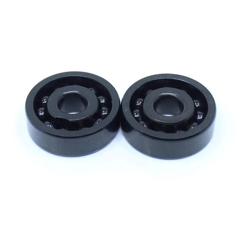 Two Pack 6006 Full Ball Bearings Rock Solid Heat Resistant Up To 500 Degrees Celsius 30X55X13MM black steel design for machinery use.