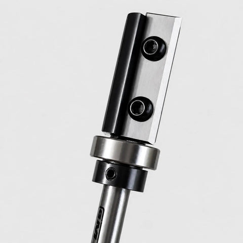 Heavy Duty Flush Trim Router Bit With Quarter Inch Shank And Five Eighths Inch Cut Diameter featuring dual reversible carbide inserts close-up.