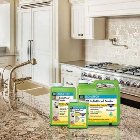 Bulletproof Stone Sealer 1 Gallon Water Based Formula displayed on a granite countertop in a modern kitchen.