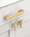Champagne bronze cabinet pull installed on white kitchen cabinet from 12 Pack 4 Inch Champagne Bronze Cabinet Pulls Set CK0015.