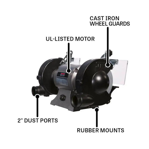 Shop Ready Six Inch Bench Grinder Powered By A Half Horsepower Motor Spinning 3450 RPM Built Different With Heavy Cast Iron Frame Includes Vitrified Aluminum Oxide Wheels Plus Attached Wire Brush For Fast Metal Prep with motor, dust ports, and wheel guards.