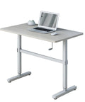 Built Different Crank Adjustable Height Standing Desk with Sweet White Maple Top, 120 by 60 Cm, laptop and decor on surface.