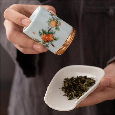 Top Tier Ceramic Food Storage Jars Set Of Twelve With Airtight Snap Lids For Spices Tea And Coffee Beans, pouring tea.