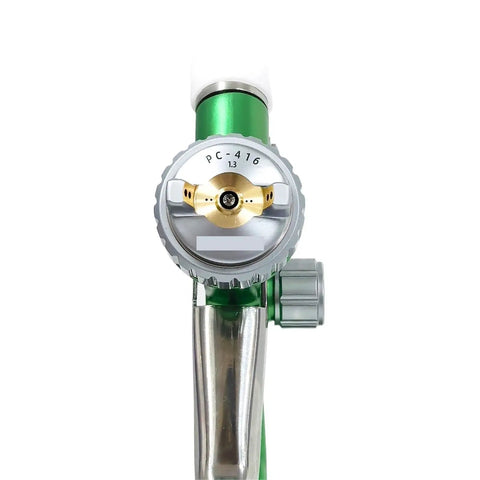 PC-416 manual spray gun nozzle view with green body and brass components, delivers low pressure high atomization to lay down a smooth as butter finish on auto panels and furniture touch ups with a relentless PC 416 manual spray gun that knocks out overspray like a champ.