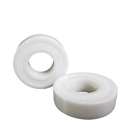 Top Shelf Rock Solid Fully Ceramic Zirconia Ball Bearings For Torque Converter Lockup Solenoid 685 Ce 5X11X4 Mm Oilless, showing two white ceramic bearings.