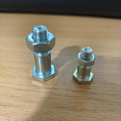 Two metal motorcycle kickstand mounting bolts with nuts, M8 and M10; hex heads shown