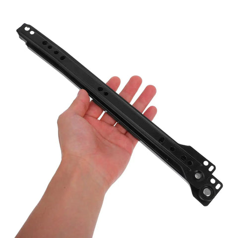 Twelve Inch Bottom Mount Drawer Slide held in hand, heavy duty metal design for smooth operation and pro level install.