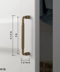 Side view of Antique Brass Cabinet Pull Handles Six Pack 5 Inch Vintage Vertical Grooved Textured Grip installed on a white cabinet.