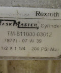 Label on Bosch Rexroth Cylinder TM-811000-03012 1-1/2 Bore By 1-1/4 Stroke Hydraulic Cylinder 200 PSI Quad Port