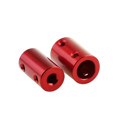 Sturdy Shaft Coupling For CNC Stepper Motors Connect 4-7Mm Shafts With Locking Wire And Aluminum Alloy Build Pack Of Three Units. Red aluminum coupling with holes for secure connections.