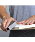 Person sanding wood with Six Pack Sanding Sponges Set With Coarse To Fine Grits 60 80 100 120 180 220 Grit Assortment