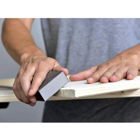 Person sanding wood with Six Pack Sanding Sponges Set With Coarse To Fine Grits 60 80 100 120 180 220 Grit Assortment