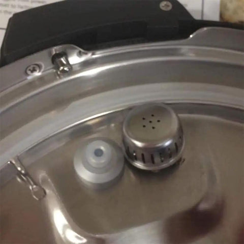 Instant Pot lid with attached float valve from Float Valve Seal Replacement Kit With 6 Gaskets For Instant Pot Duo And Ultra Models 3 5 6 Qt And Lux 3 Qt Duo Plus 3 6 Qt Not For Duo 8 Qt Includes 2 Float Valves And 6 Gaskets Easy Install