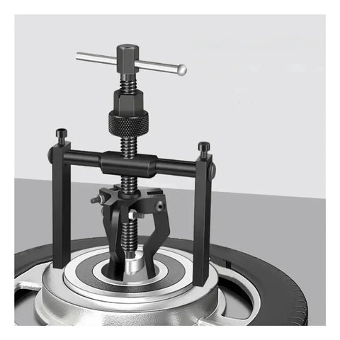 Shop Pro Built Tough 5 To 10 Ton Hydraulic Three Jaw Bearing Puller Kit close-up of tool in use for hub extraction.
