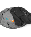 Wetsuit Changing Mat And Dry Bag For Surfing And Kayaking All In One 30 Inch Leakproof Gear Mat with wetsuit on gray surface