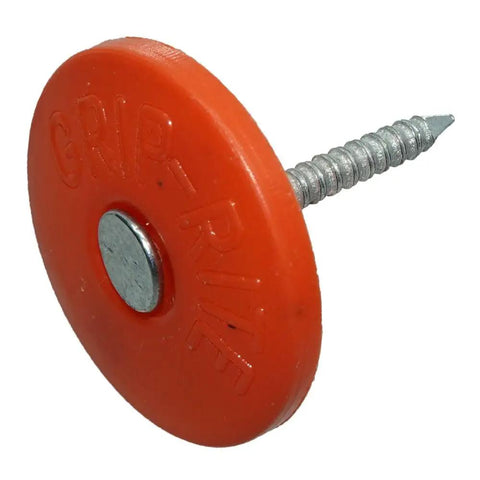 Orange disc with nail attached, labeled 'GRIP-RITE', close-up view.