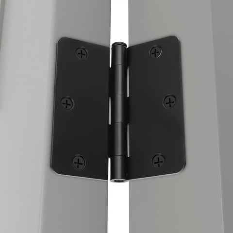 Close-up of a 24 Pack Matte Black Door Hinges Three And A Half Inch Rounded Interior Hinges With Quarter Inch Radius Corners installed on a door.