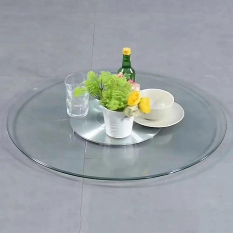 Beefy 28 Inch Lazy Susan Rotating Turntable For Tabletop Serving Tray With Tempered Glass Top displaying dishes and plant decor
