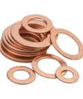 Stack of copper washers from 110 Piece Copper Sealing Washer Set, Six Sizes, Flat Gasket Oil Seals For Plumbing And Automotive