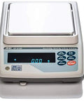 Top Shelf Industrial Grade Precision Balance Built Around A Super Hybrid Sensor For Lightning Fast Measurements And Dead On Accuracy With Zero Compromise Performance Specifications digital scale with stainless steel platform and clear display.