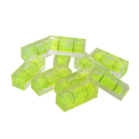Eleven Piece Mini Picture Hanging Level Featuring Precision Spirit Bubble And Quick Measure Grids For Straight Up No Sweat Wall Art Framing Or Shelf Mounting Setup In Compact Green Pmma Design