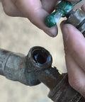 Repairing faucet with 48 Piece Faucet Washers And Brass Bibb Screws Assortment for DIY and professional plumbing use