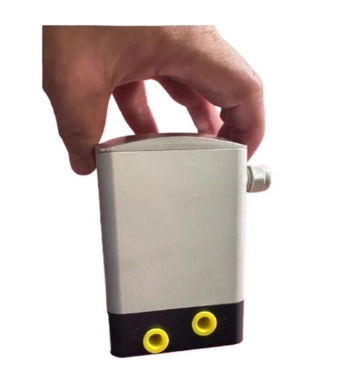 Electric proportional valve with aluminum body and black base, two yellow inlet ports, side connector.