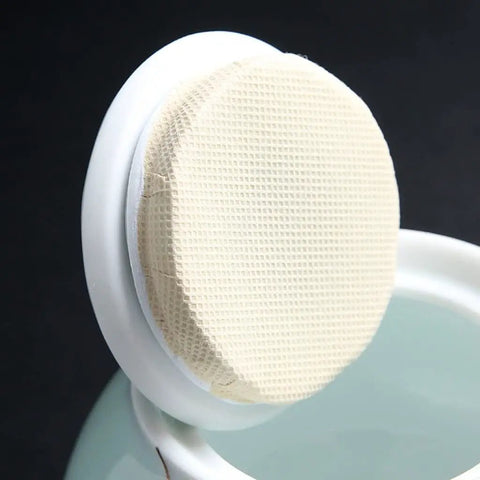 Top view of the lid of an Airtight Ceramic Coffee Canister Porcelain Tea Caddy With Tight Seal Lid Keeps Your Stash Fresh As A Dime For Kitchen Pantry Organization Blue Jar.